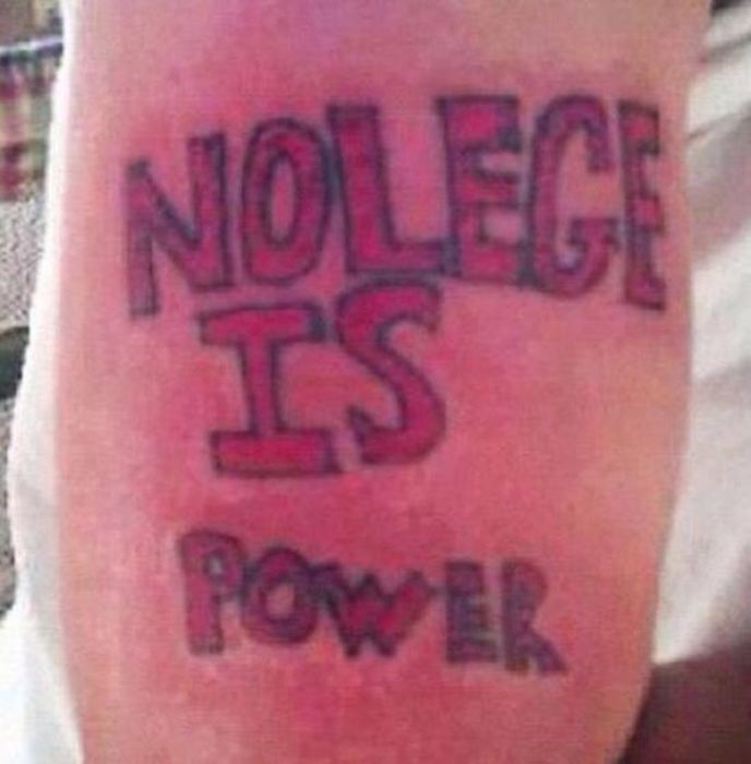 There's A Good Chance That These Are The Worst Tattoos Ever (27 pics)