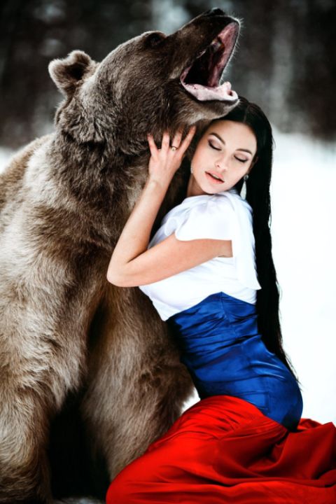 Beautiful Model Poses For A Snowy Photo Shoot With A Friendly Bear (7 pics)