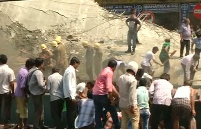 Overpass In India Collapses And Traps Over 150 People (8 pics)