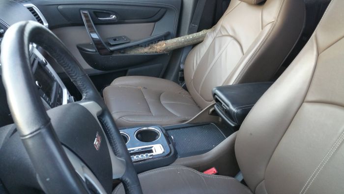Large SUV Gets Penetrated By A Big Wooden Stick (3 pics)