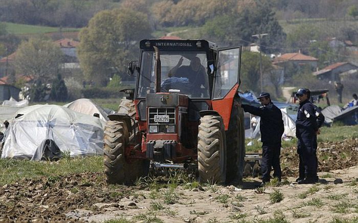 Greek Farmer Runs Down The Tents Of Syrian Migrants With His Tractor (9 pics)