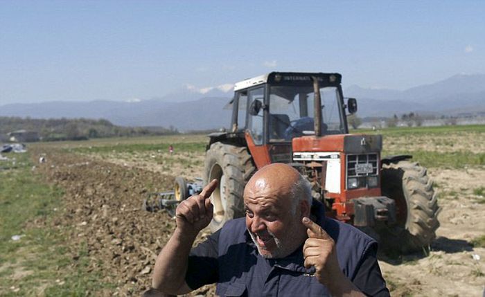 Greek Farmer Runs Down The Tents Of Syrian Migrants With His Tractor (9 pics)