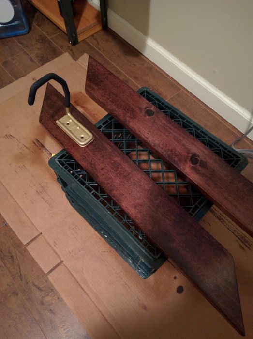 Guy Creates An Awesome Bike Rack With Two Pieces Of Wood And A Hook (7 pics)