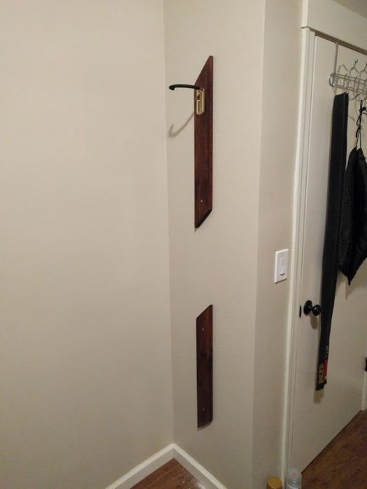 Guy Creates An Awesome Bike Rack With Two Pieces Of Wood And A Hook (7 pics)