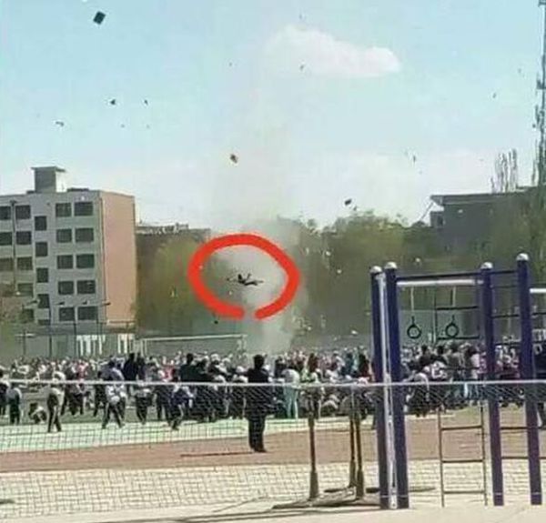 Chinese Boy Gets Sucked Up By Dust Devil Twister (4 pics + video)