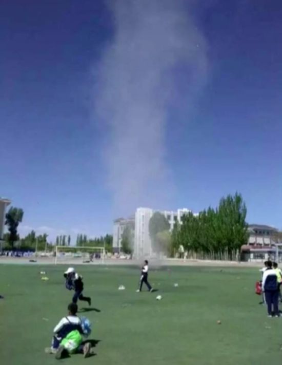 Chinese Boy Gets Sucked Up By Dust Devil Twister (4 pics + video)