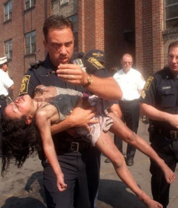 Cop Saves Girl's Life In 1998 Then Attends Her Graduations 18 Years Later (2 pics)
