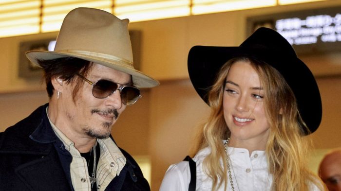 Amber Heard Is Divorcing Johnny Depp And She's Accusing Him Of Being Abusive (4 pics)
