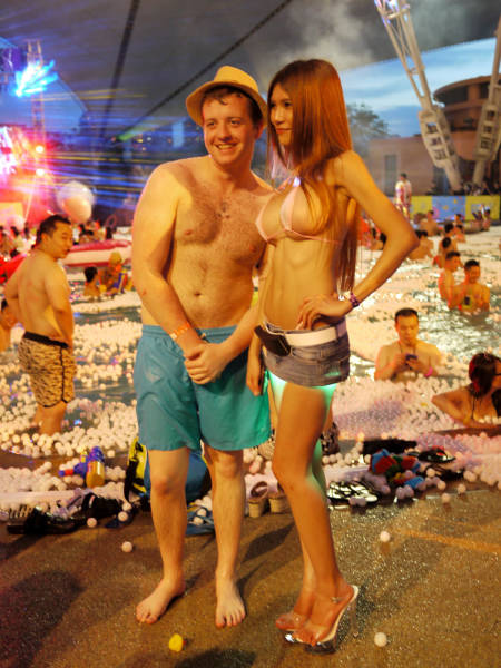 Chinese Woman Lands Modeling Jobs By Walking Around Half Naked (27 pics)