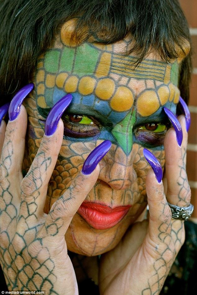 Former Bank Employee Modifies Their Body To Look More Like A Dragon (11 pics)