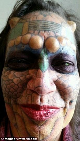 Former Bank Employee Modifies Their Body To Look More Like A Dragon (11 pics)