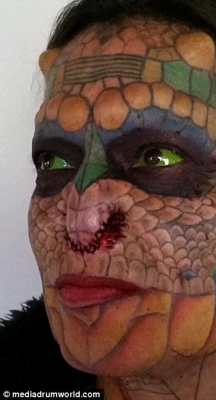 Former Bank Employee Modifies Their Body To Look More Like A Dragon (11 pics)