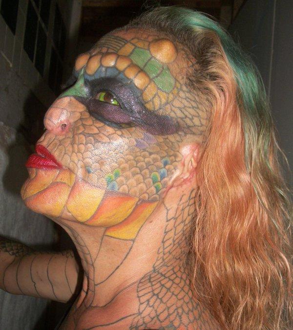 Former Bank Employee Modifies Their Body To Look More Like A Dragon (11 pics)