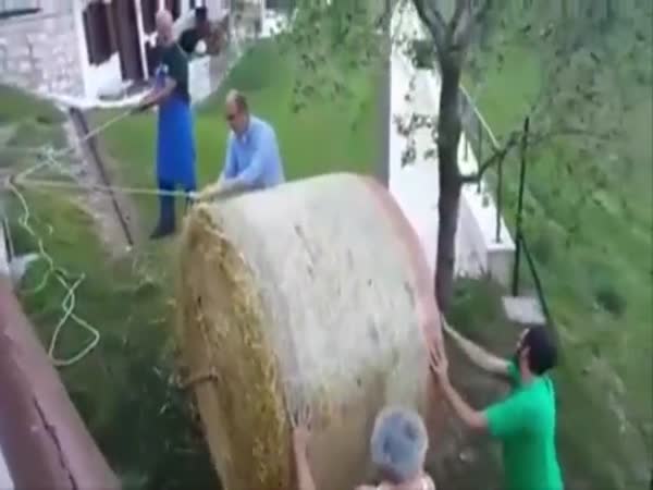 Farmers Lose Bale Of Hay In Spectacular Fashion