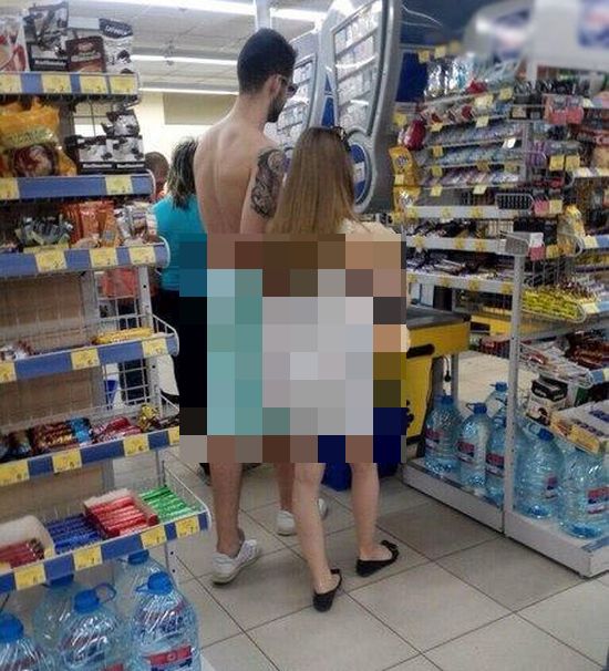Couple Shops While Dressed In Odd Clothing (2 pics)