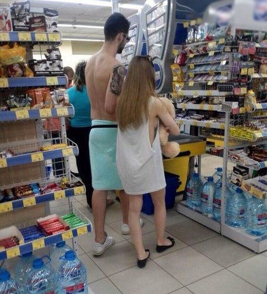Couple Shops While Dressed In Odd Clothing (2 pics)