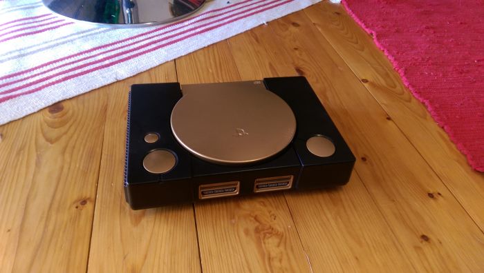 Gamer Tranforms A Playstation One By Giving It An Epic Paint Job (9 pics)