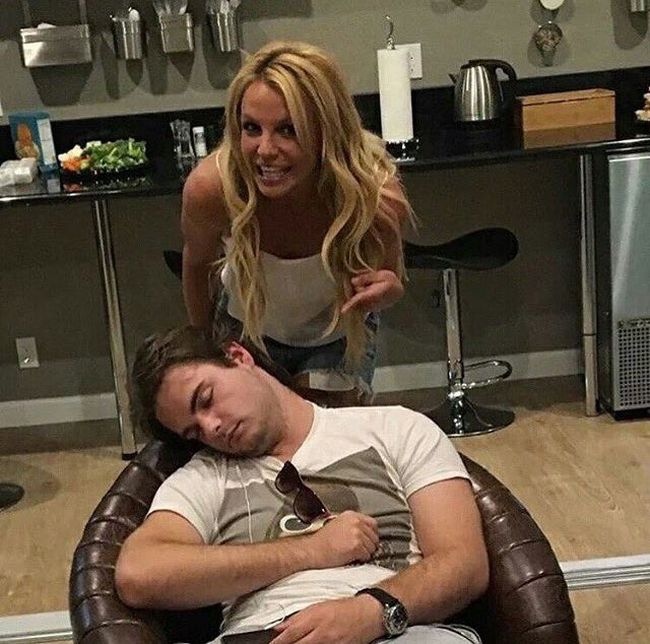 Britney Spears Poses For A Picture With A Sleeping Fan  