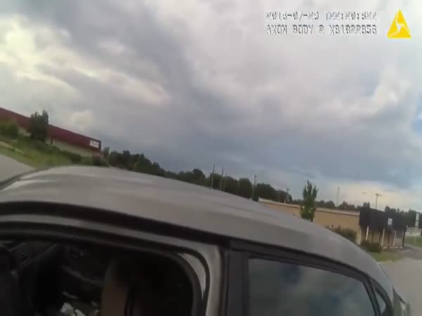 Woman Drags Officer When She Floors It After Being Pulled Over