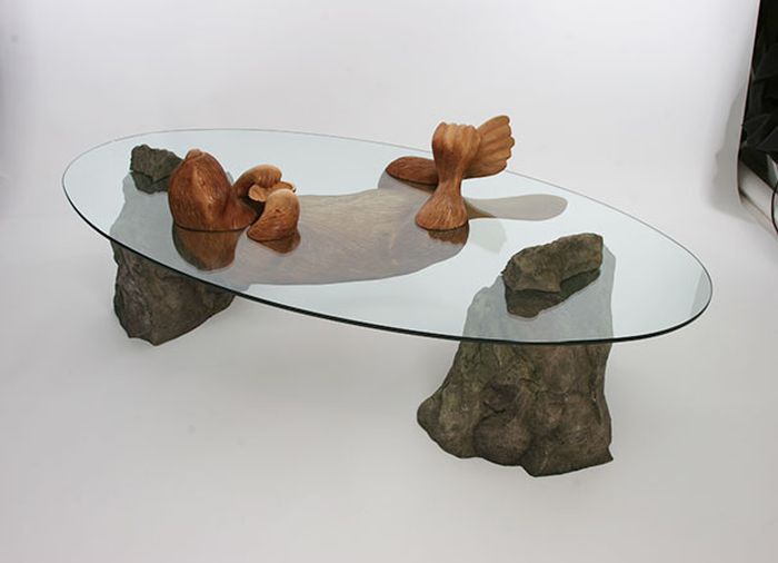 Clever Tables Make It Look Like Animals Are Emerging From Water (9 pics)