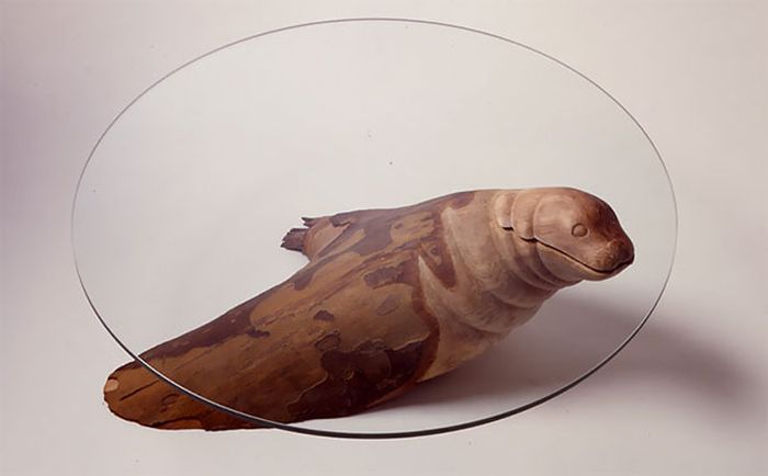 Clever Tables Make It Look Like Animals Are Emerging From Water (9 pics)
