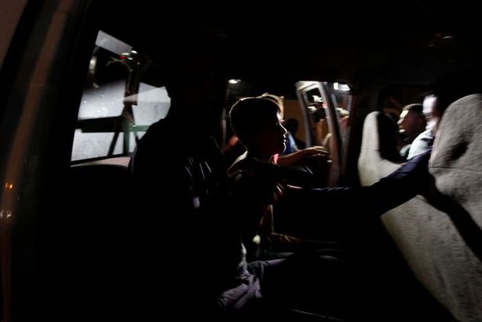 Police Remove Suicide Vest From Distressed Young Boy In Iraq (5 pics)