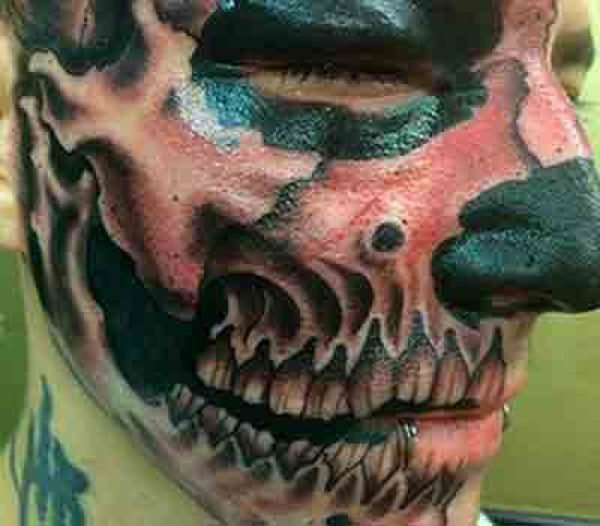 Man Gets Skull Tattooed On Half His Face (3 pics)