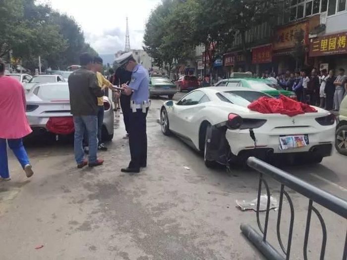 Two Ferraris Collide After A Dog Runs Into The Road (10 pics)