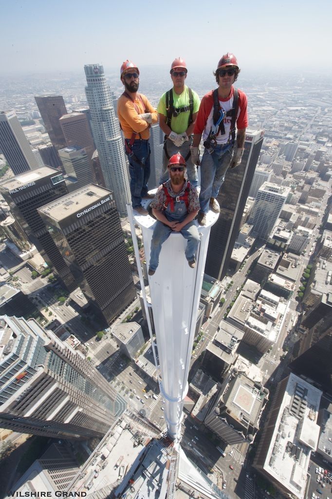 Workers Pose For A Dangerous Photo Atop The Wilshire Grand Center (2 pics)
