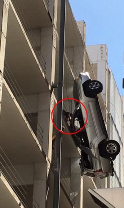Guide Wire Saves Man From Falling Nine Stories (6 pics)