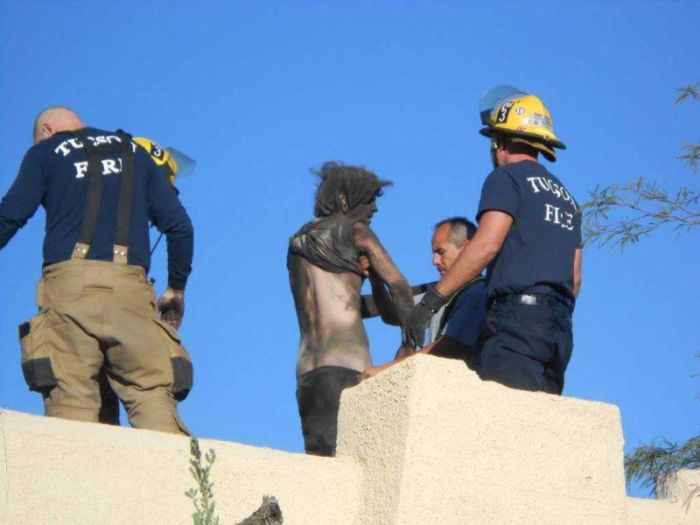 Guy Gets Pulled Out Of Chimney After Forgetting His Keys (4 pics)
