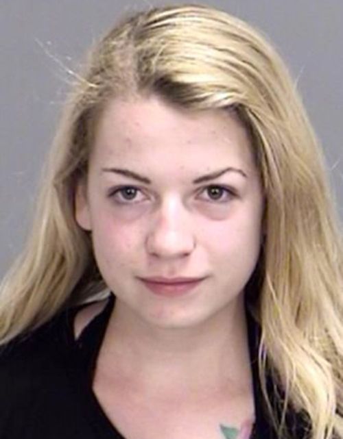 Student Crashes Into Police Car While Taking Topless Snapchat Pic (3 pics)