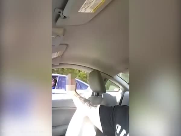 Motorist Gives Driver The Finger Who Then Pulls Out A Hand Gun