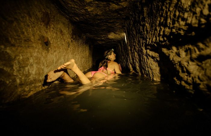 Real Life Indiana Jane Surfs Past Skeletons In The Catacombs Of Paris (13 pics)