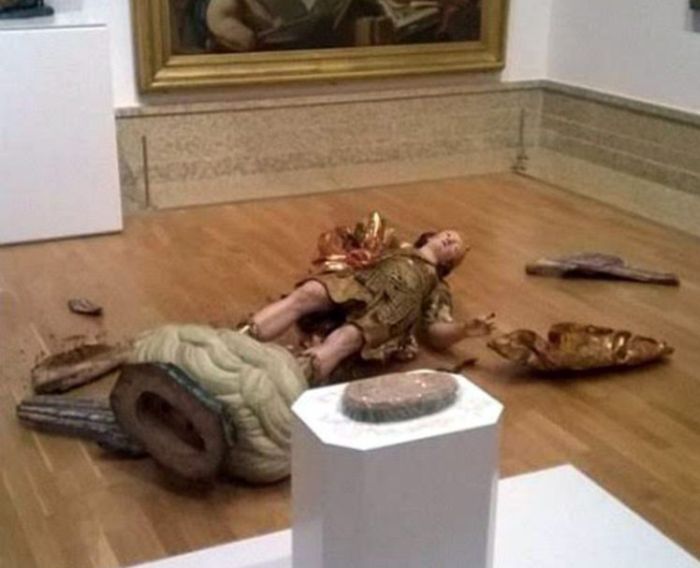 Tourist Smashes Statue While Trying To Take A Selfie (2 pics)