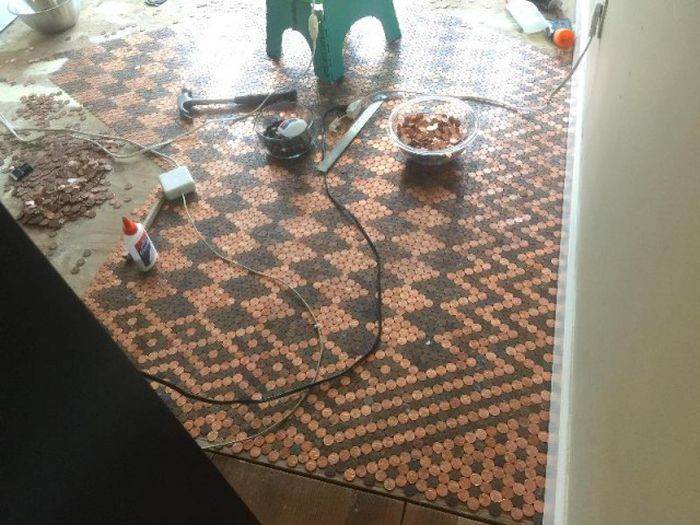 Woman Covers Her Entire Floor In Pennies (13 pics)
