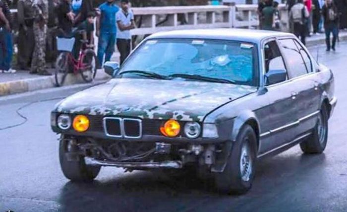 Man Rescues 70 People From ISIS Snipers Using Bulletproof BMW (4 pics)