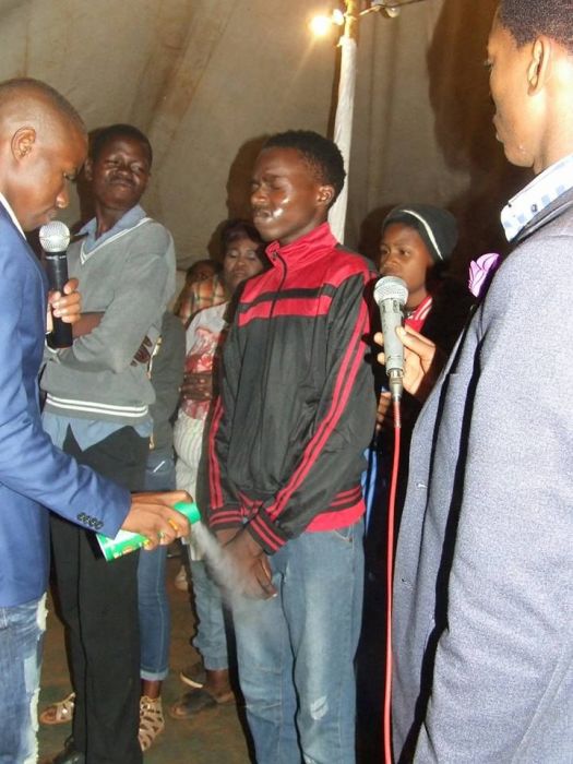 A South African Pastor Is Spraying People With Pesticide (9 pics)