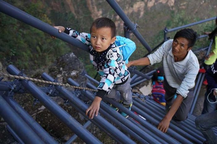 Chinese Government Builds A Ladder So Students Can Safely Get To School (16 pics)