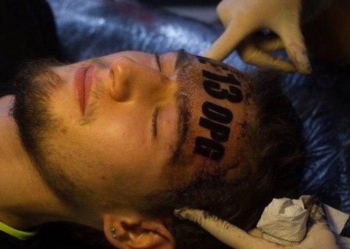 It Won't Be Long Before This Guy Regrets This Forehead Tattoo (3 pics)
