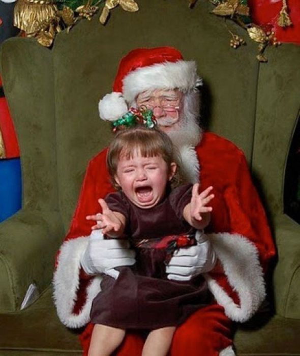 The Horrifying Reality Of Taking Your Kids To See Santa (27 pics)