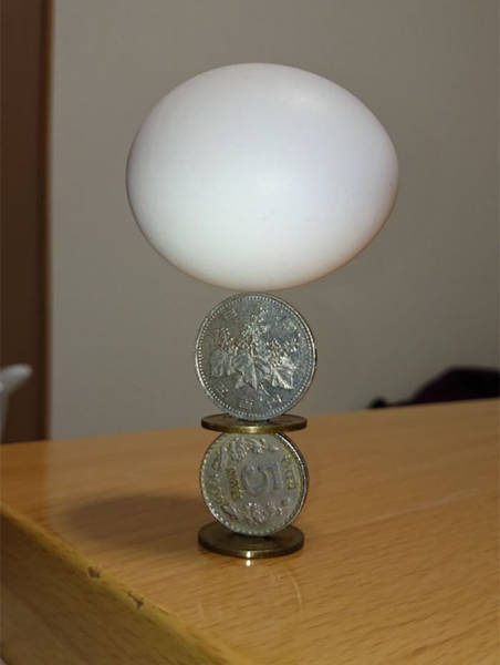  Japanese Guy Takes Coin Stacking To The Extreme (12 pics)
