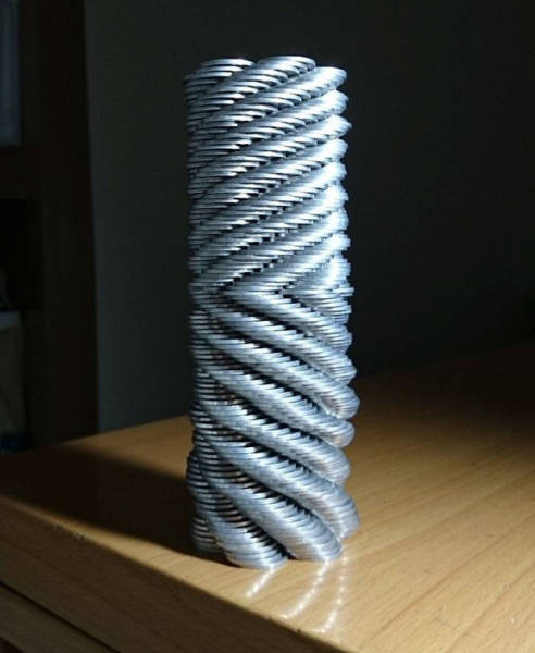  Japanese Guy Takes Coin Stacking To The Extreme (12 pics)