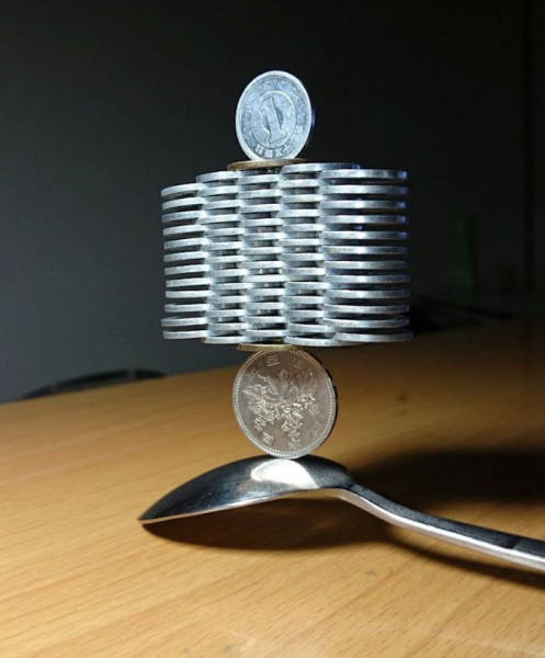  Japanese Guy Takes Coin Stacking To The Extreme (12 pics)