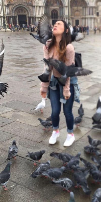 Woman Tries To Take A Photo With The Pigeons At St. Mark's Cathedral (2 pics)