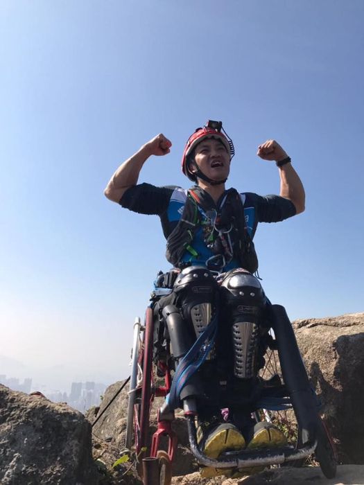 wheelchair strong mountain china chi lai paraplegic climbs meter wai athlete inspiring