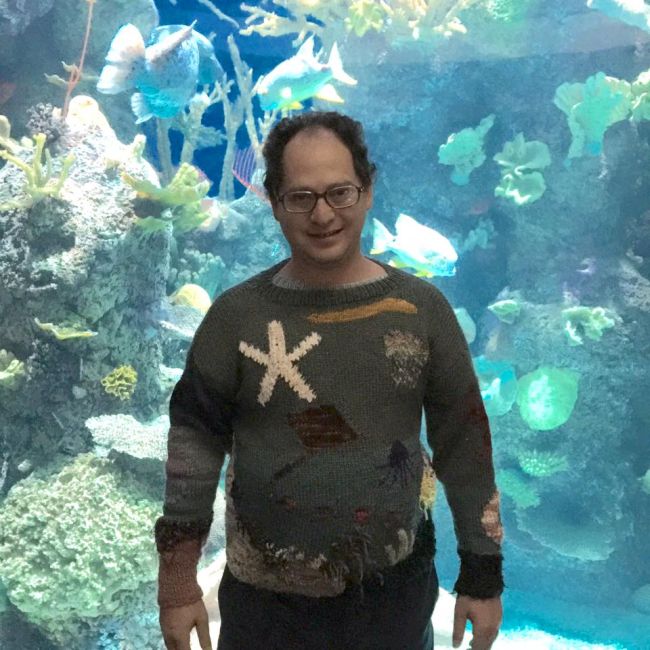 Guy Makes Sweaters Of Specific Places Then Wears Them To Those Places (24 pics)