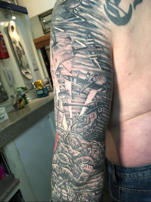 Guy Shows Off His Amazing World War II Cover Up Tattoo (8 pics)