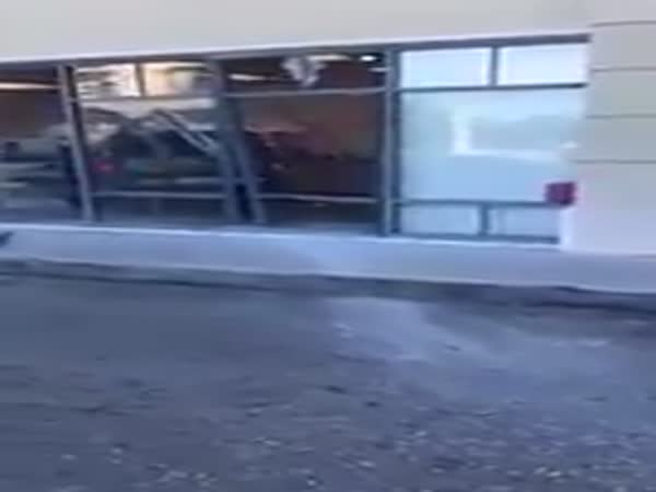 Woman Drives SUV Into T Mobile Store