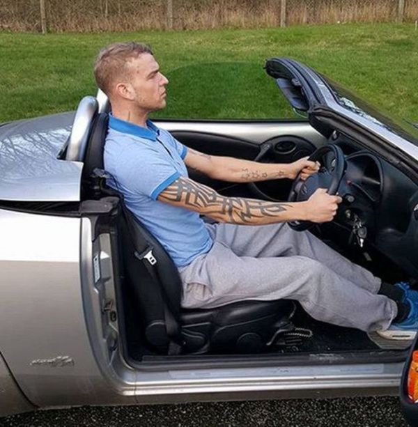 Tall Englishman Gets Busted For Driving While Standing (2 pics)